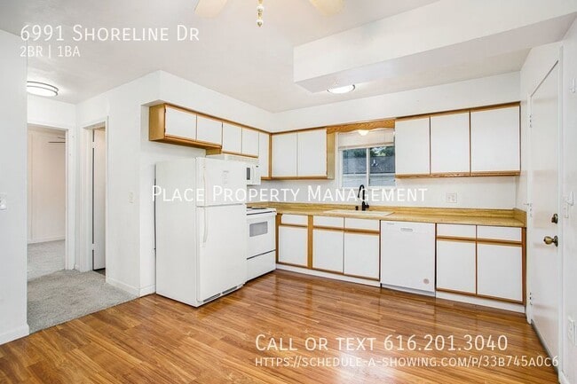 Building Photo - 6991 Shoreline Dr