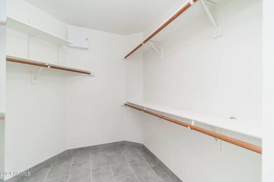 Primary bedroom closet - 6739 E Gelding Dr