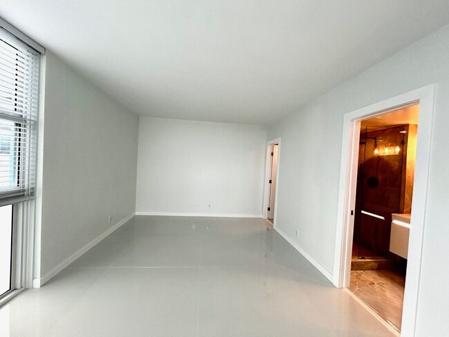Building Photo - Fully Renovated East-Facing 2BR/2BA + Bonus Room | Ocean Views | In-Unit W/D