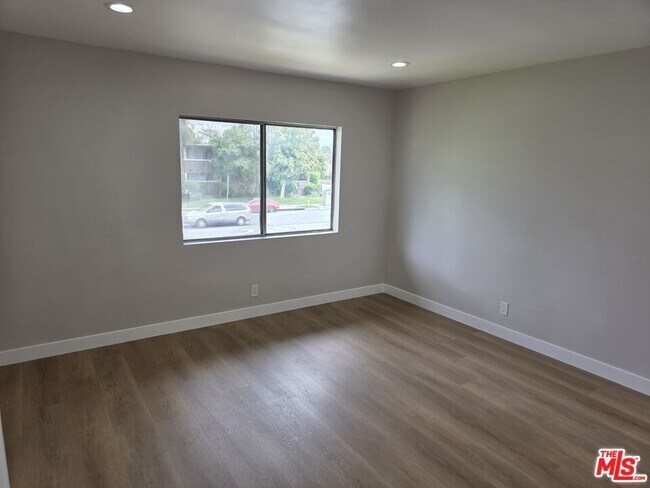 Building Photo - 14747 Woodruff Ave