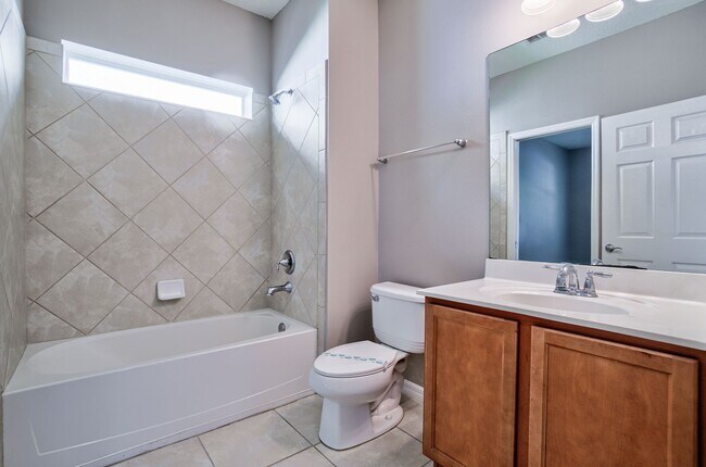 Building Photo - Beautiful 3/3 w/ 2 Car Garage in Gated Vil...