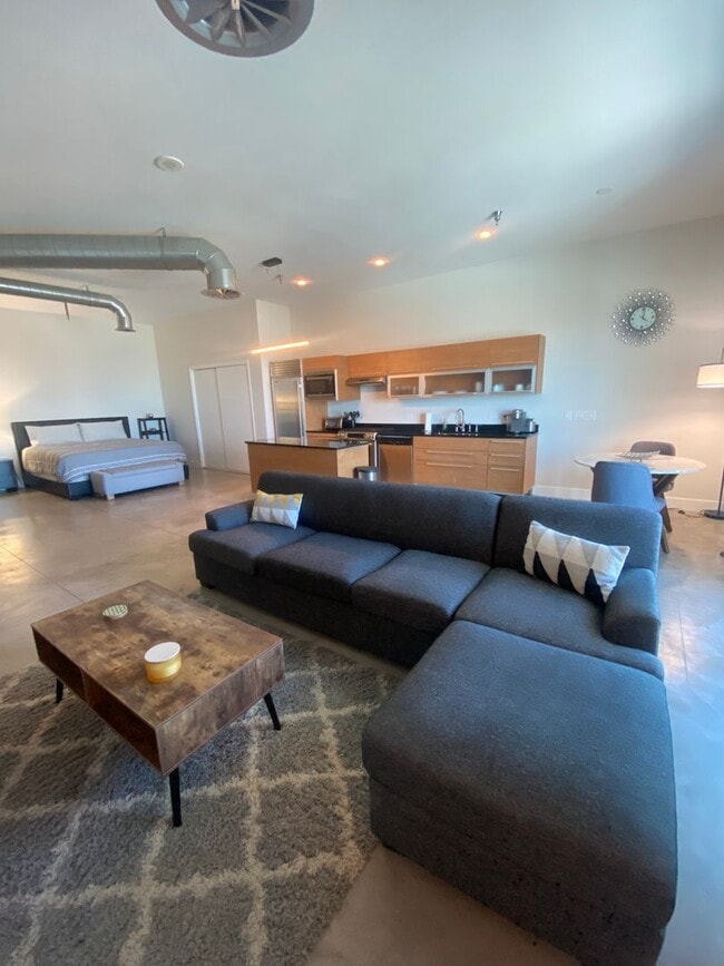 Building Photo - Stunning Fully Furnished Loft with Breatht...