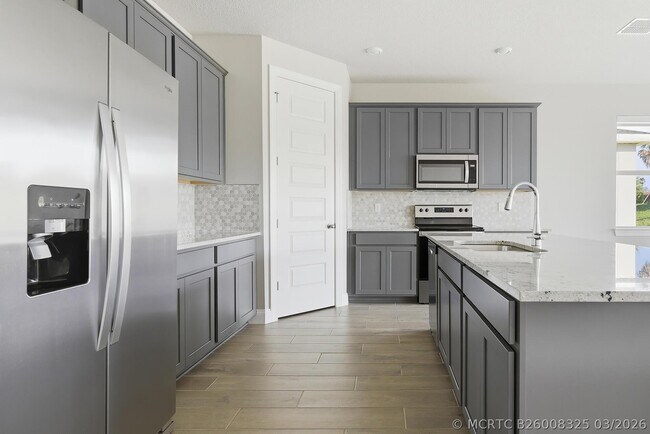 Building Photo - 8558 Dahlia Cir