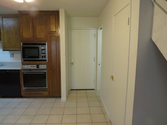 Building Photo - Centrally Located Large Two Story Condo wi...