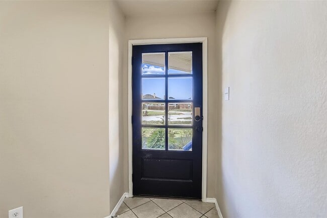 Building Photo - This well-maintained 4 bedroom home is located in a quiet neighborhood that has a community park ...