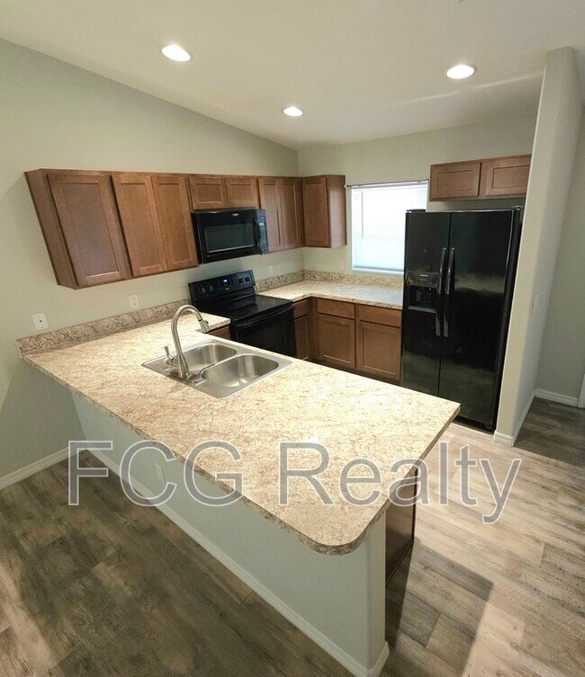 Building Photo - 9383 N Peachtree Way