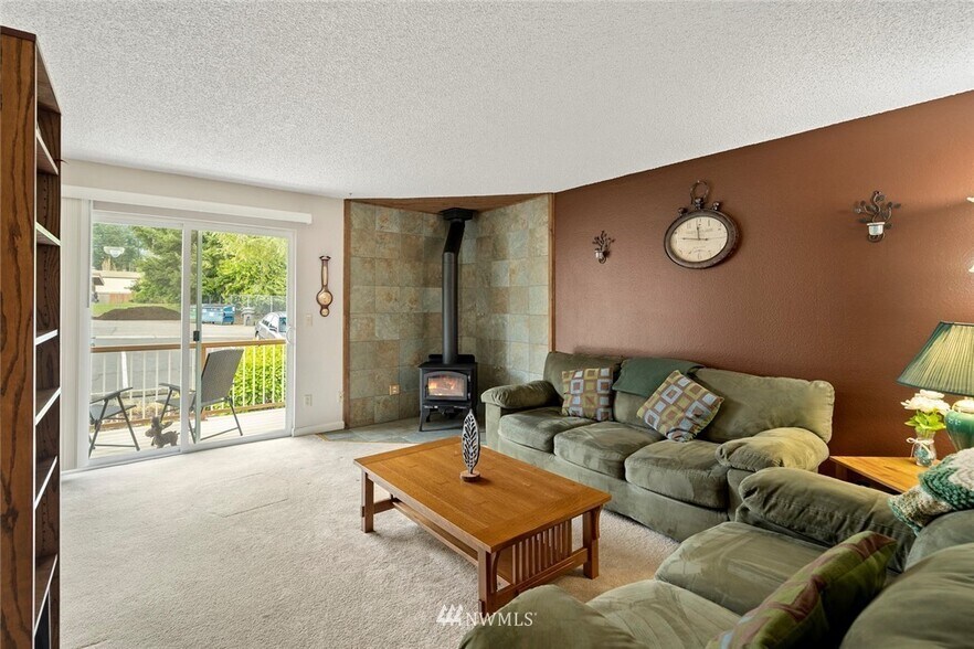 Living room with wood-burning stove - 14124 74th Pl NE