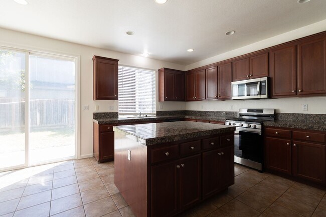 Building Photo - Coming Soon!! Spacious 4-Bedroom Home with Loft