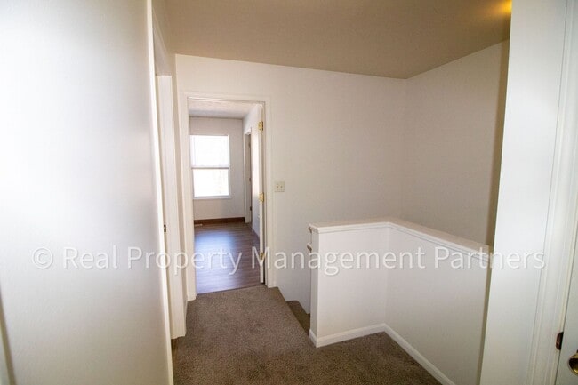 Building Photo - Forest Hills 3 Bed Townhome with Garage, Pond View and Some Utilities Included