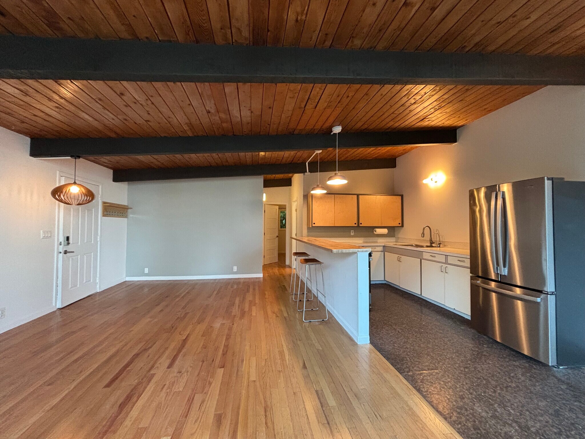 Living area and kitchen - 3323 Windolph Loop NW