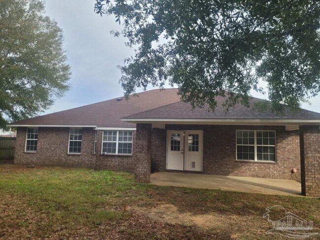 Building Photo - 5863 Chi Chi Cir