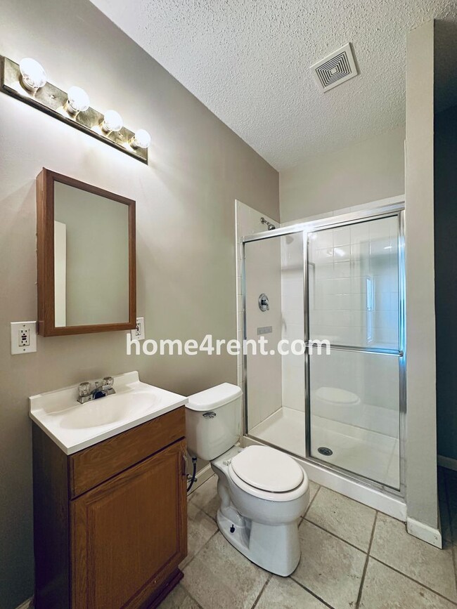 Building Photo - Brand New Paint, Wood Floors, Walkout Fini...