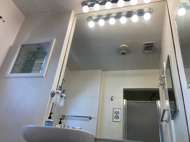 Bathroom plenty of bright light - 4454 Laurelgrove Ave