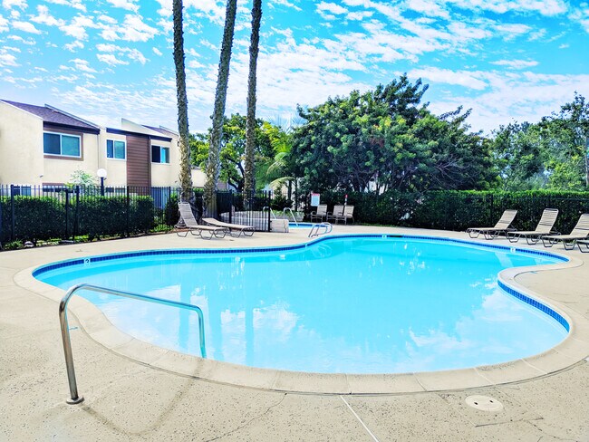 Pool Area. The home is the far the unit. - 7823 Tommy Dr