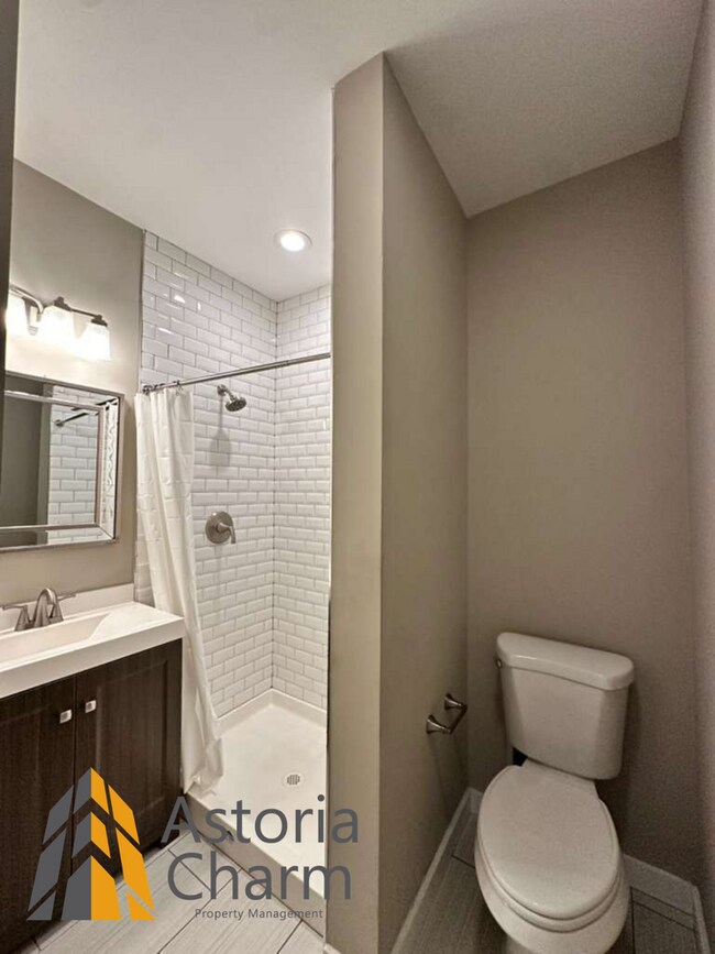 Building Photo - Beautifully Renovated 3BR Rowhome Near Johns Hopkins – Gated Parking + Modern Upgrades