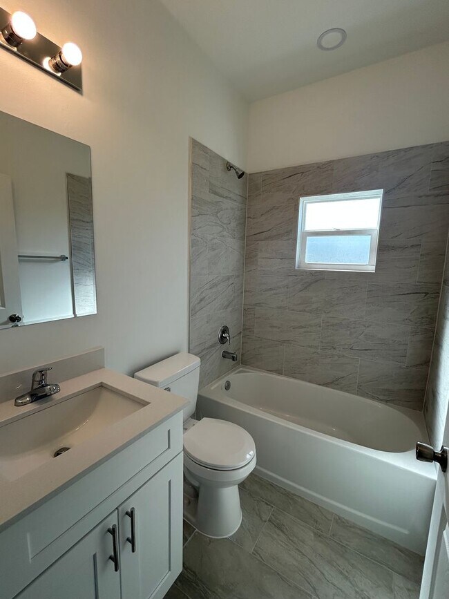 Building Photo - BRAND NEW Modern 4BR/2BA Home with Garage – Peaceful Lake Placid Retreat