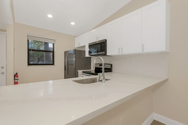 Building Photo - Fully Renovated Corner 1/1 “Villa” with Ba...