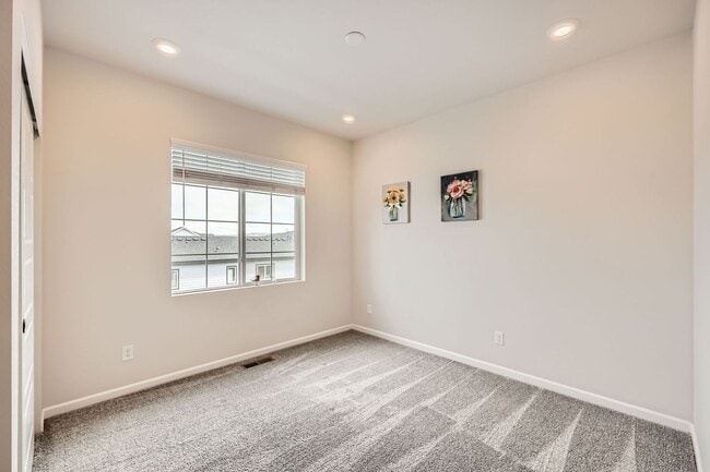 Building Photo - Evolve Real Estate: Available Immediately! Almost NEW Large 3 Bedroom in STERLING RANCH!