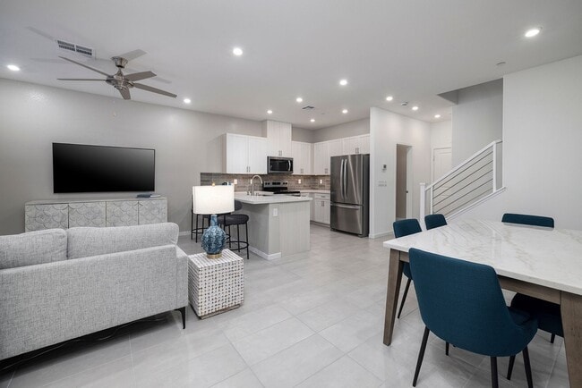 Building Photo - FULLY FURNISHED BRAND NEW TOWNHOME WITH 3 BEDROOMS + 2 CAR GARAGE