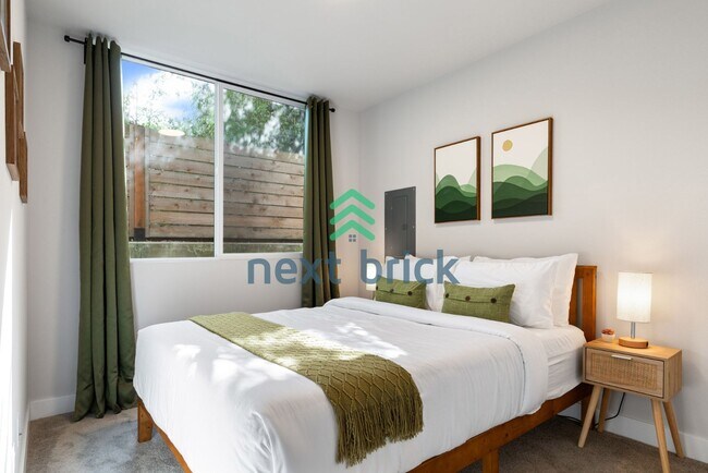 Building Photo - Offer: Unfurnished option available at $3,250, with an optional furnished package for an addition...