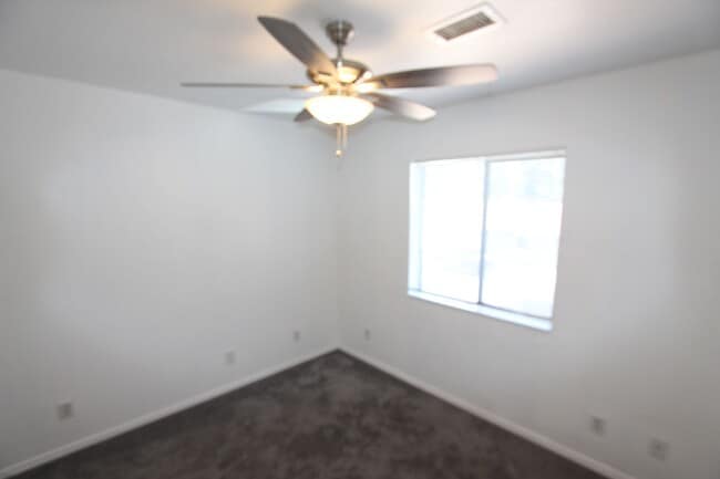 Building Photo - Spacious East Side 4BR Townhome with Fenced Yard