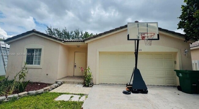 Building Photo - 10420 SW 24th Ct