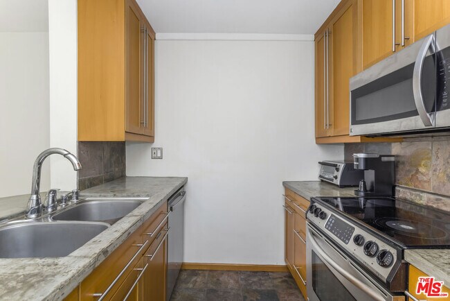 Building Photo - 1230 N Sweetzer Ave