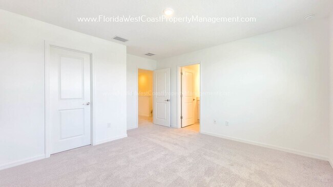 Building Photo - OUTSTANDING BRAND NEW TOWNHOME MOVE IN READY! AZARIO TOWNHOMES LWR !