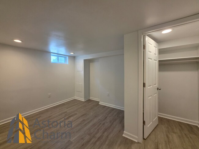 Building Photo - 3 Bedroom End Unit with Finished Basement and Fenced Yard on E 28th Street