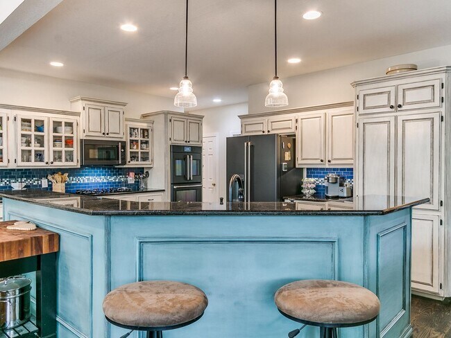 Building Photo - This stunning 4-bedroom, 3.5-bathroom home...
