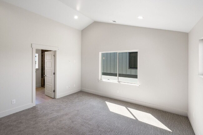 Building Photo - Lock-and-Leave Luxury Living — Lawn Care & Snow Removal Included!