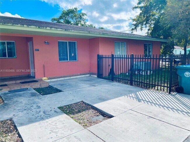 Building Photo - 5857 NW 13th Ave