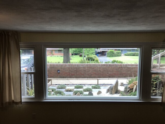 view out from living/dining room...a low wall screens out the street - 4805 Randolph Dr