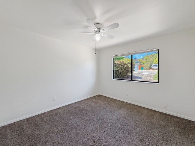 Building Photo - Spacious 4-Bedroom Retreat in the Heart of...