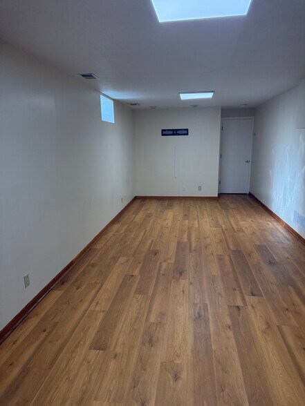 Living Room in Basement - 14707 Dominica Ct