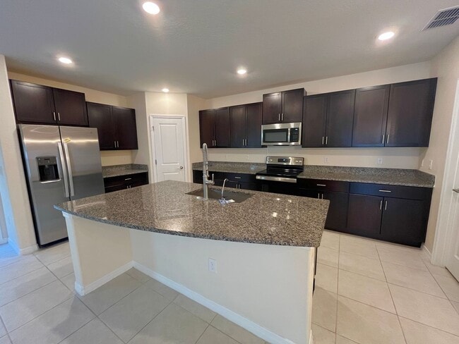 Building Photo - 50% Off First Month’s Rent! Spacious 5-Bed...