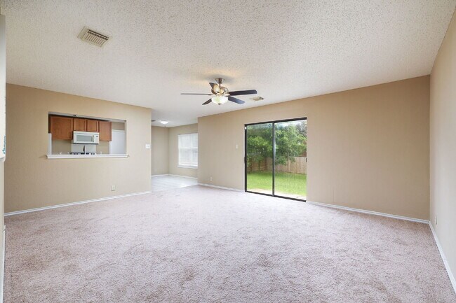 Building Photo - Spacious 3-Bedroom Home with Game Room and...