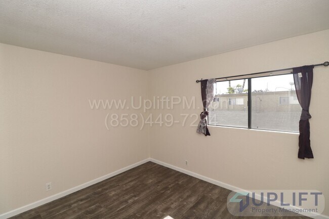 Building Photo - 2-bedroom, 2-bathroom home in a gated comm...