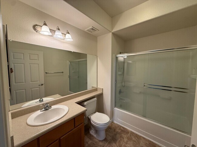 Building Photo - 2 bed | 2bath | 1039 SF | Private Garage & Assigned Parking | Downstairs unit |Owners pays for WS&G!