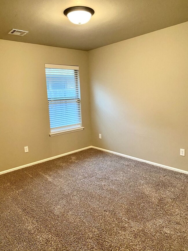 Building Photo - Cute Home In Mustang Schools With Storm Sh...