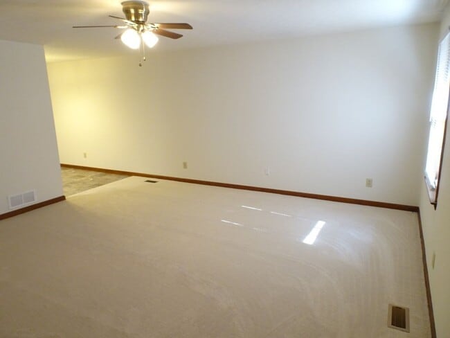 Building Photo - Great location, large wooded and fenced ya...