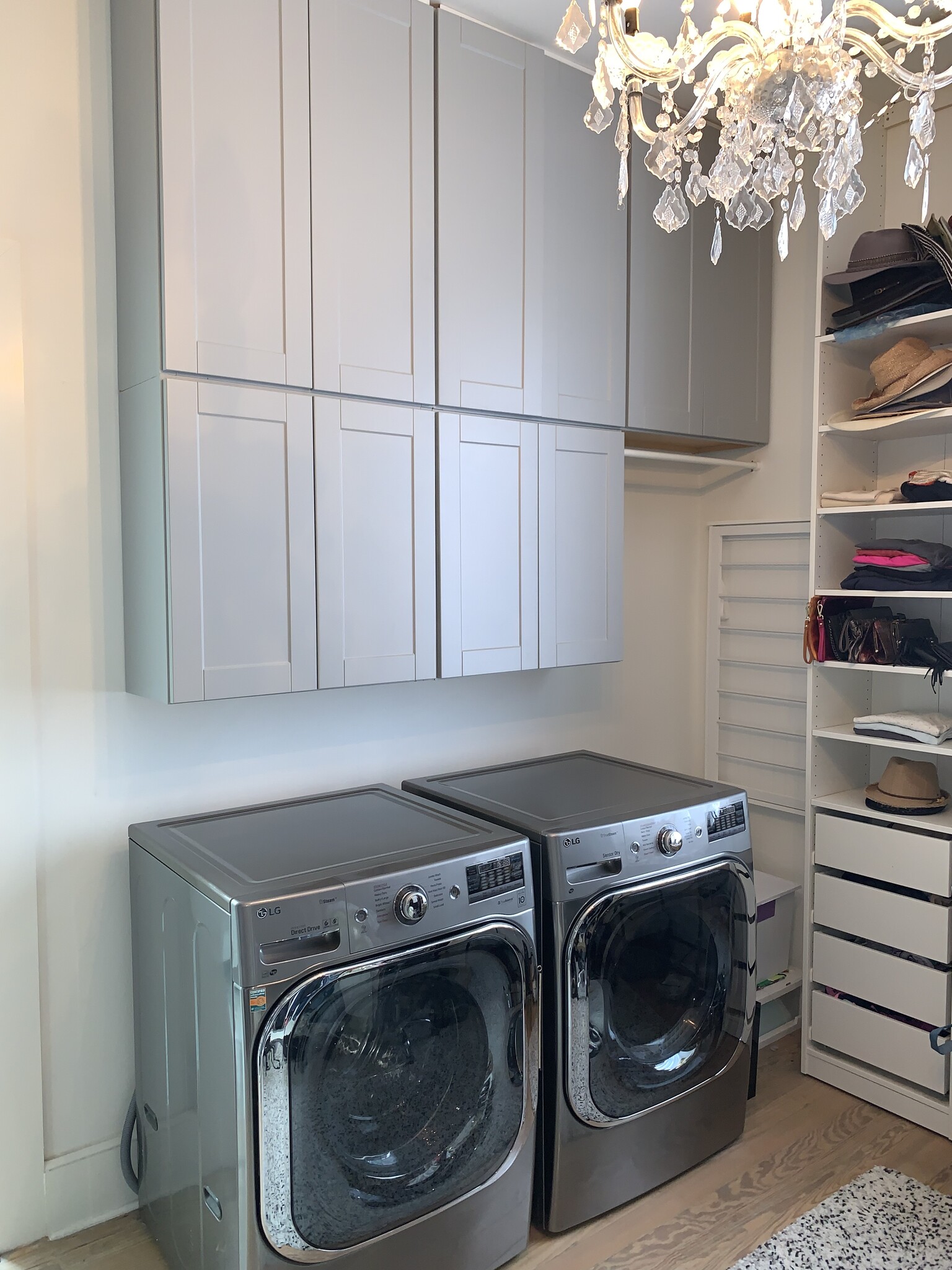 Laundry section of primary closet/dressing area. - 1316 Pleasant St