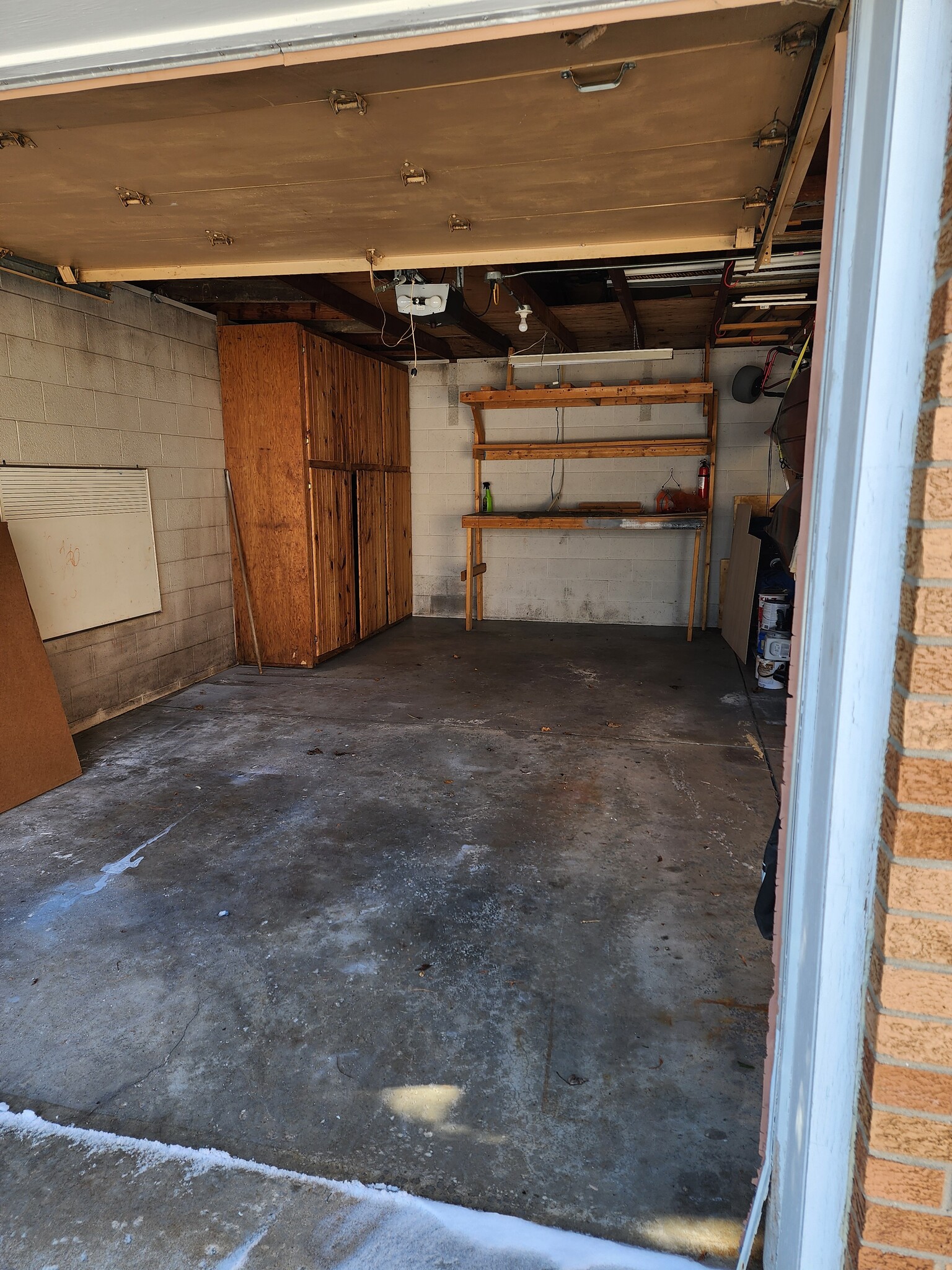 Shared single car garage with storage - 135 Ridge Ct