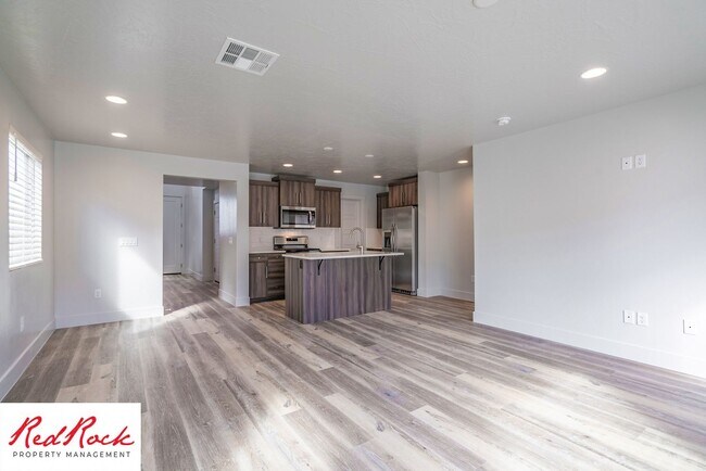 Building Photo - Innovative Design! 4 Bedroom Home in the Beautiful Desert Playa Community