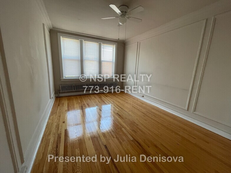 Building Photo - 1373 W Estes Ave