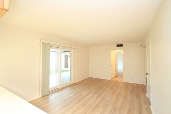 Building Photo - Welcome to this beautifully refreshed 4-bedroom, 2-bath two-story home located in desirable North...