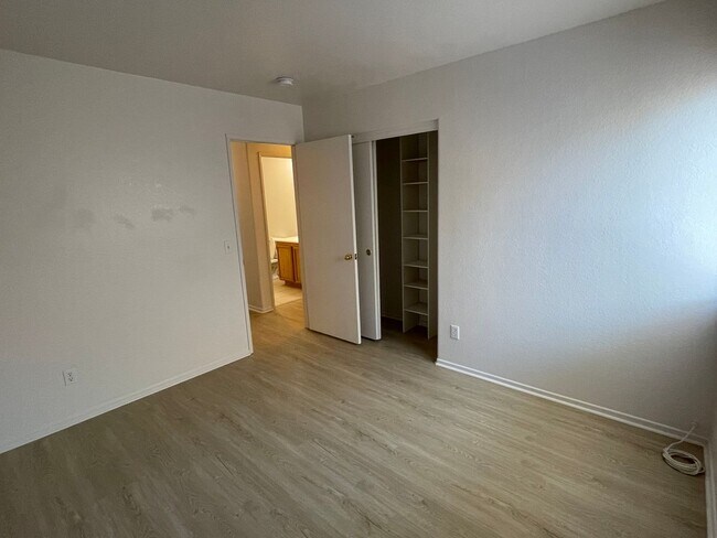 Building Photo - Adelanto Home-3 Bedrooms,2 Bathrooms, Laminate Floors, Indoor Laundry Room, Large Back Yard