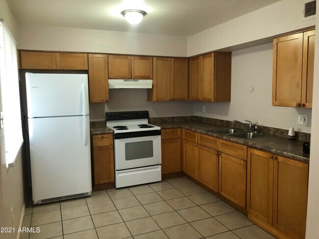 Building Photo - 1138 W Dragoon Cir