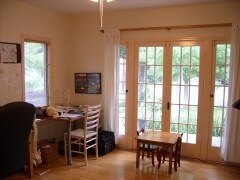 7. DNRM- french doors overlooking porch, front and side yard - 680 Highland St