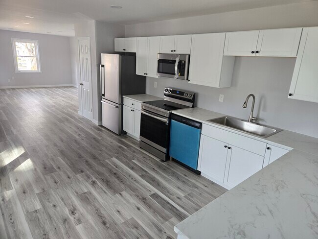 Eat-in Kitchen #2 toward Living Room - 151 Lilac Dr